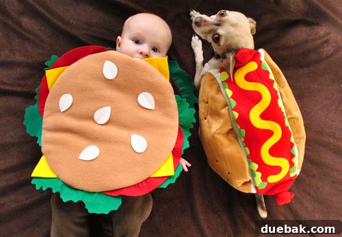 Clara dressed as a hamburger and Burger as a hot dog