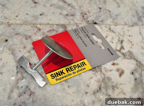Two small, shiny chrome faucet hole covers for kitchen granite
