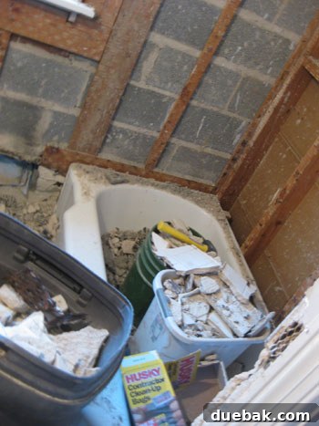 Our First Home: A Collection of Cherished Memories 9 Debris in a bathroom during demolition