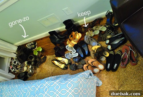 A collection of shoes laid out for decluttering