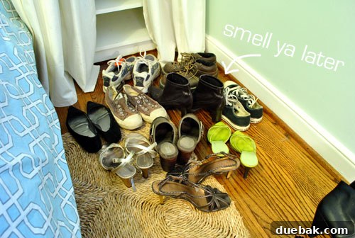 Another view of the shoes separated into piles for decluttering