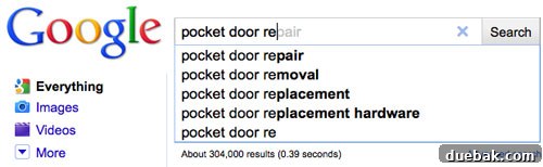 Get Your Pocket Door Gliding Smoothly 3 Inspecting a Pocket Door Track with a Flashlight