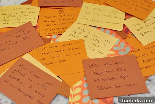 Thanksgiving Thanks Jar gratitude notes spread out on table as part of holiday craft tradition