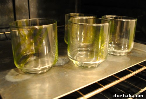 Craft Personalized Glasses with Paint Pens 3 Close-up of a hand-painted glass tumbler with pine needle design.