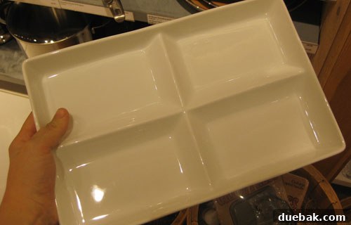 Stylish ceramic serving tray, ideal for presenting appetizers, desserts, or home decor items.