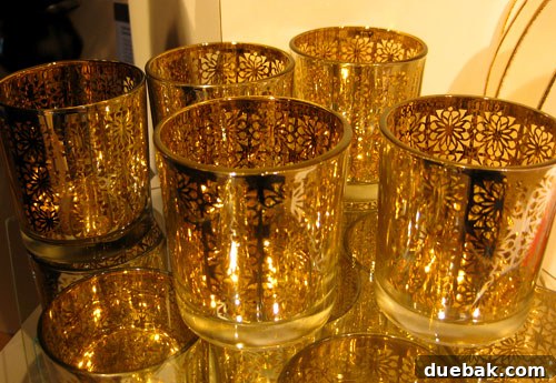 Beautiful votive glasses, perfect for candles or small decorative items, a great gift for creating ambiance.