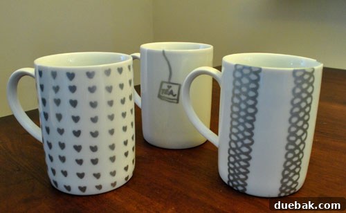 Sparkle Your Sips: Silver Sharpie Mug Decor 3 Customized mug with wavy ribbon patterns