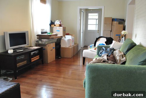 Smart Moving: Checklists and Pro Tips 4 Den With Furniture Packed To Move Into Moving Truck, showcasing efficient packing