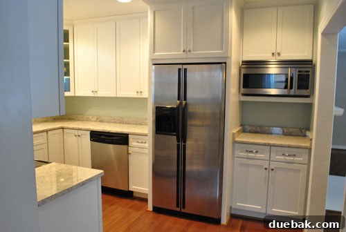 The Last Echoes of Our First Home 11 A final view of the empty kitchen, showcasing its readiness for new occupants.