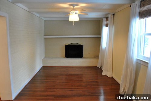 The Last Echoes of Our First Home 14 The empty den on our final day, showcasing its clean lines and open space.