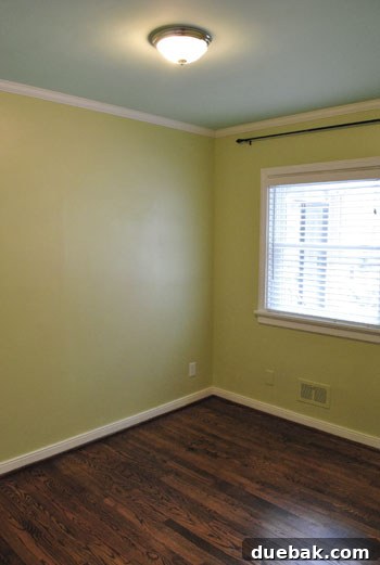 The Last Echoes of Our First Home 22 Clara's nursery, now empty after removing her special light fixture and curtains.