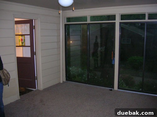 The Last Echoes of Our First Home 23 The sunroom as it appeared when we first moved into the home, bright and airy.