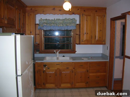 The Last Echoes of Our First Home 8 The kitchen of the old house when we first moved in, before any personal touches.