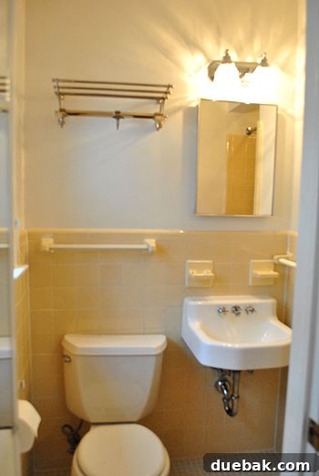 Yellow and beige bathroom suite, a former master bath now a prime renovation project