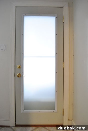Master Frosted Glass: The Bubble-Proof Method 10 Cleaned up laundry room wall with space for art
