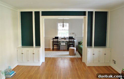 Transform Built In Bookcases With A Painted Back 3 Newly painted built-in bookshelves in a striking deep blue-green color, empty and ready for styling with books and decorative items. The smooth finish highlights the transformative power of paint.