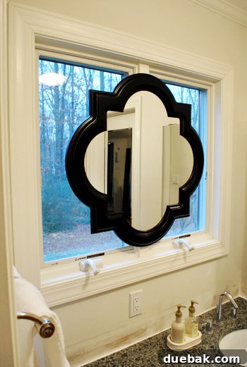 Close-up of mirror on window frame