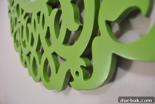 Dreamscape Nursery Art 8 Close-up of mirror's bottom frame, showing concealed security screws