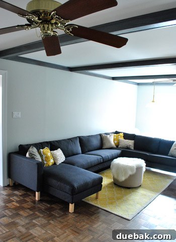 Give Your Wood Ceiling Beams A Gray Wash Makeover 6 Living room beams appearing darker and moodier in the evening light