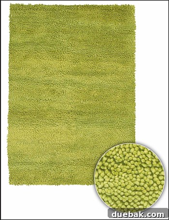 Close-up of a new, bright yellow shag rug with a plush texture, lying on hardwood floors.