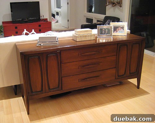 Stylish wooden console table, a thrift store find, showcasing home decor deals in Richmond, VA.