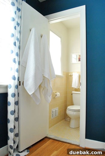 The Guest Bath: Unfussy Utility 2 Clean and functional small bathroom with vintage yellow tiles.
