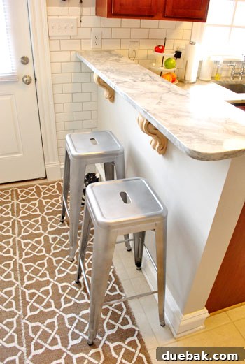 Kitchen floor with two Ballard Designs runners taped together