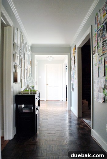 A section of the completed hallway gallery wall, leading to another area