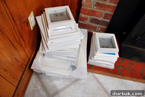 A pile of new picture frames from Ikea, ready for the next gallery wall project