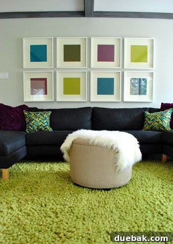 Plush Emerald Shag: Living Room's Green Oasis 2 Close-up view of a thick, green shag rug on a light wooden floor.