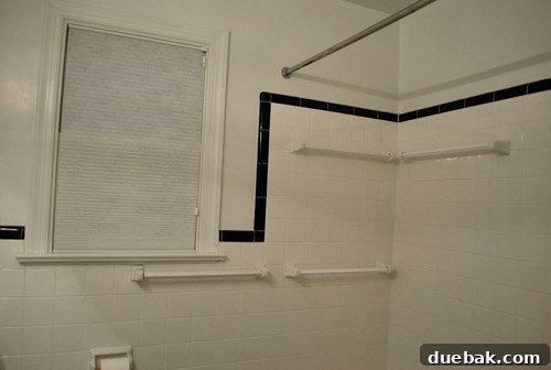 Clever Trim Tricks for Damaged Tiles 5 Bathroom window showing missing bottom trim, a potential solution