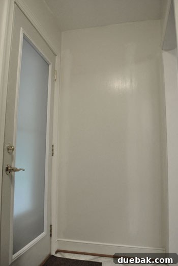 How to Permanently Repair Wall Cracks 11 Third image of the laundry room post-initial changes, focusing on improved light