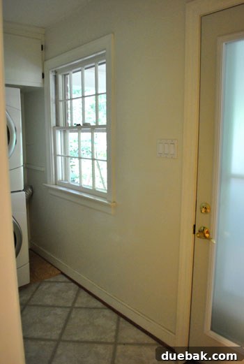 How to Permanently Repair Wall Cracks 10 Another view of the updated laundry room, showcasing cleared space for future storage