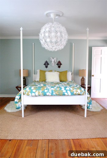 Corner view of the bedroom featuring the dresser and bed
