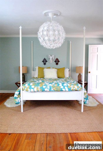 Current master bedroom with new bed, duvet, curtains, and rug