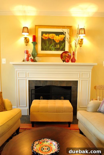 Formal living room with a classic fireplace and elegantly carved mantel