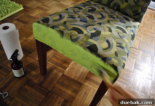Transform Your Upholstery With Fabric Paint Medium 11 In-progress shot of painting the dining chair fabric apple green