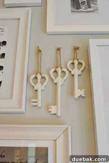 Large Painted Metal Keys on Display 5 Three painted iron keys hung with twine at varying heights, ready for display.