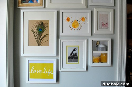 Peacock feather, birthday print, and framed book cover