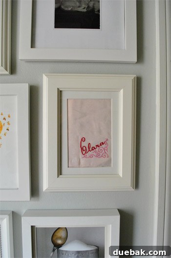 Framed vintage hankie with baby Clara's name