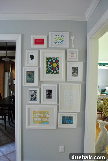 Framed key placeholder, fabric swatch, family photos, and silhouette
