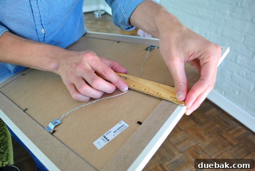 Measuring the hanging point on a picture frame