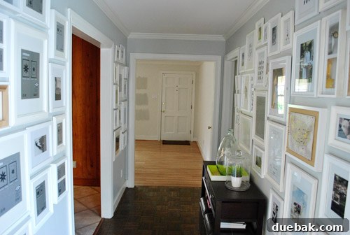 Full view of art-less frames in the hallway gallery