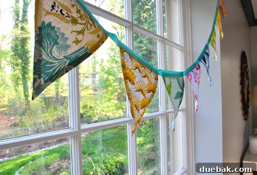 The complete fabric flag banner displayed, ready for a celebration.