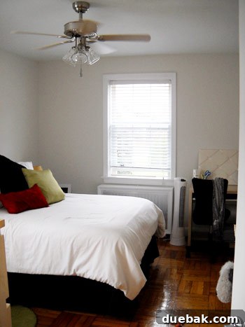 Gift the Canvas of Imagination 4 A bare, empty bedroom with white walls before painting.