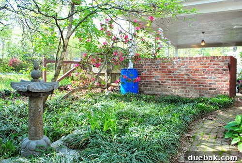 Easy Rain Barrel Setup 11 Outdoor area with rain barrel and future patio plans