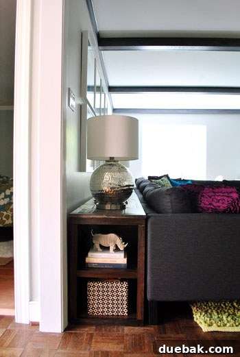 Another perspective of the console table, highlighting its rustic finish and modern decor.