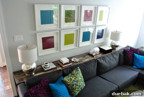 Right side of the console table, featuring a matching lamp and other styling details.