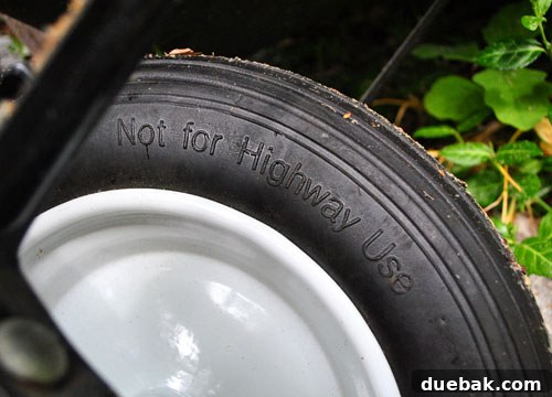 Achieving a Flawless Foundation for Your Paver Patio 19 Warning label on a new wheelbarrow tire