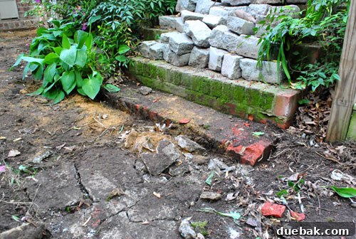 Achieving a Flawless Foundation for Your Paver Patio 6 Shattered concrete after successful demolition with sledgehammer